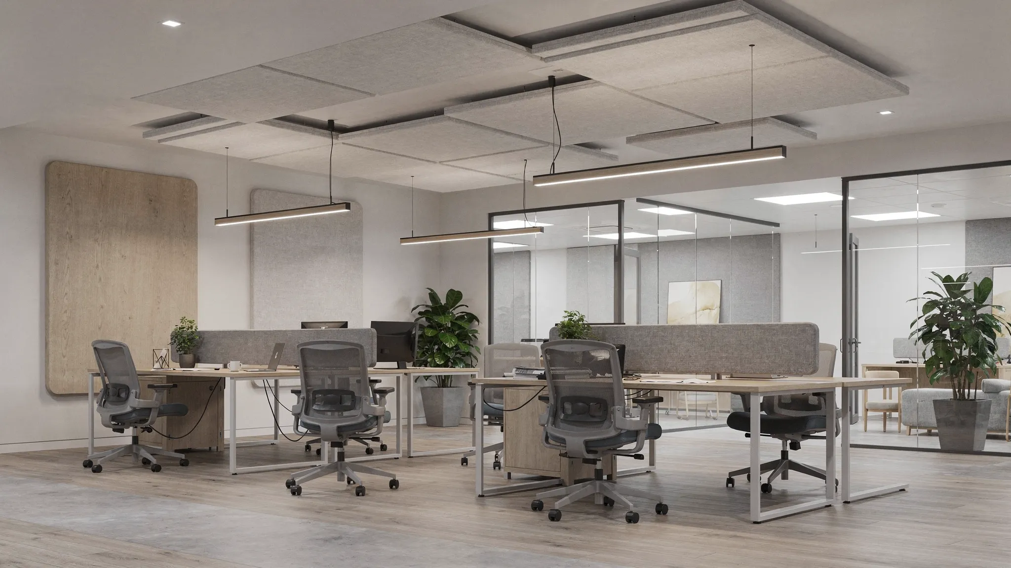 Een rustige kantoorzone met akoestische plafondpanelen boven werkplekken, gecombineerd met minimalistische verlichting en een mix van harde en zachte materialen voor een gebalanceerd interieur.