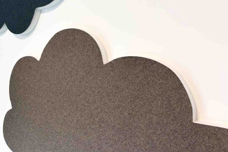 Reducel Surface wandpaneel voorzien van bruin textiel.